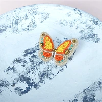 Topitos Alas de Mariposa Naranja